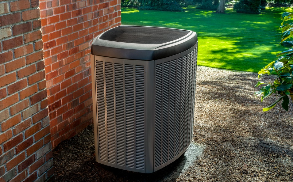 Heat pump HVAC unit on the side of a single family home