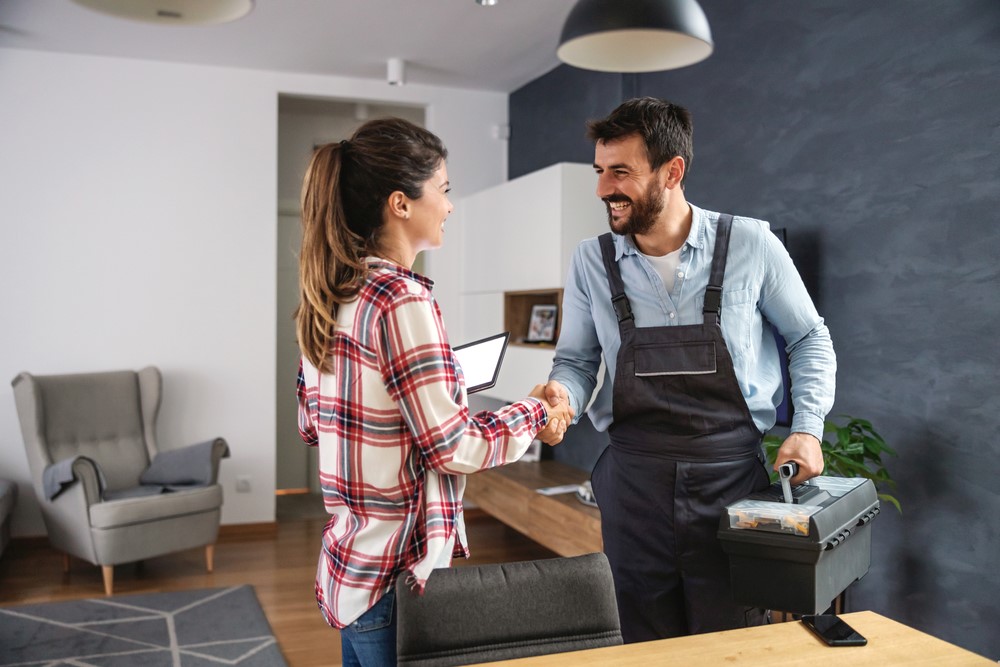 boiler service person meeting customer