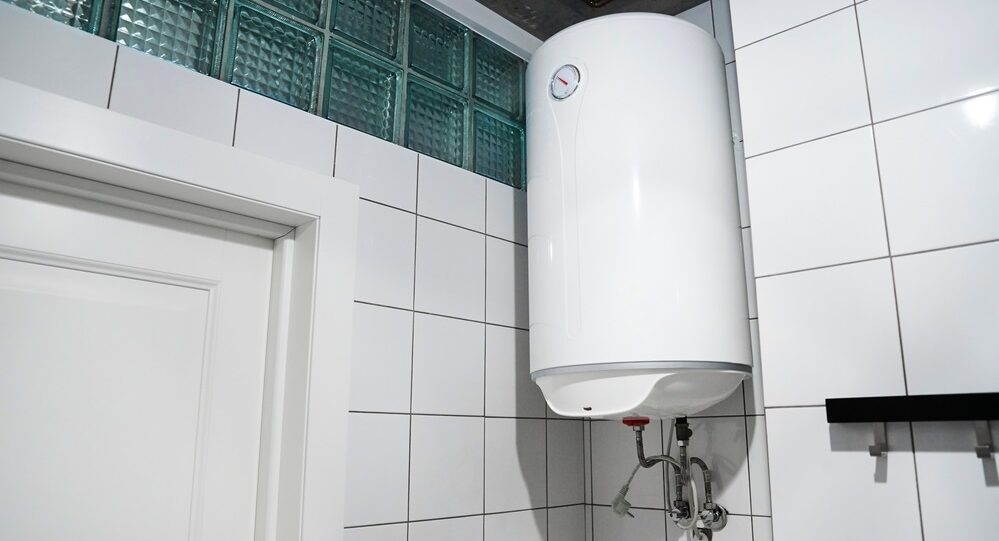 budget water heater hanging on the wall in boiler room