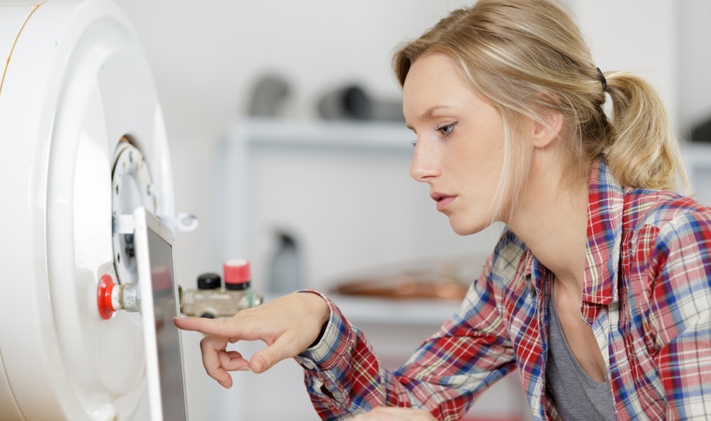 woman fill water into the boiler